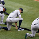 Illustration for article titled Every Single Player, Coach of the New York Yankees, Washington Nationals Took a Knee Last Night...It Just Wasn't During the National Anthem